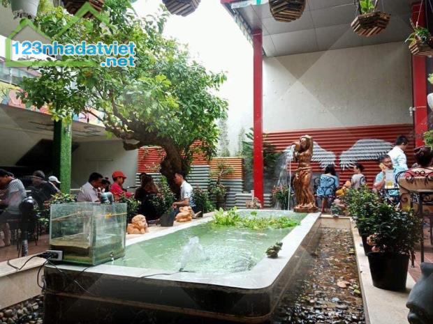 Bán nhà 1 trệt 2 lầu  sân thượng, 2 mặt tiền trước sau đường Tôn Đức Thắng và Phan Văn Trị - 2