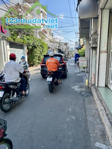 NHÀ BÁN MẶT TIỀN ĐƯỜNG XÓM CHIẾU- KHU DÂN CƯ SẦM UẤT- THÍCH HƠP VỪA Ở VỪA KINH DOANH ĐA