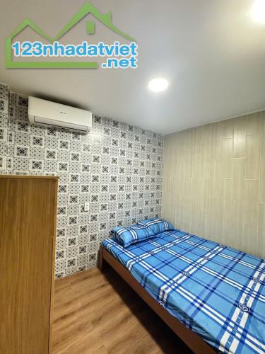CHDV 5 TẦNG THANG MÁY - BÙI ĐÌNH TUÝ - 12 PHÒNG KHÉP KÍN CAO CẤP - 70TR/THÁNG - 16.3 TỶ. - 1