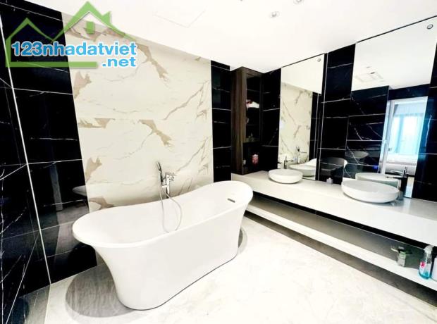 Bán tòa VP mặt phố Tôn Thất Tùng, 103m2, 9 tầng 1 hầm thang máy, mặt tiền 6m, nhỉnh 55 - 2