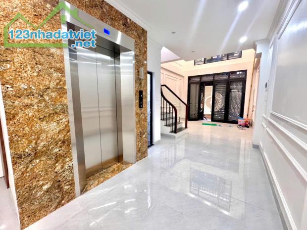 BÁ.N NHÀ ĐỊNH CÔNG THANG MÁY 6 TẦNG  OTO ĐỖ CỬA- NHÀ MỚI Ở NGAY - 1
