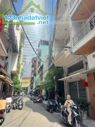 BÁN NHÀ 4 TẦNG SẴN DÒNG TIỀN 7.000$/THÁNG - MẶT TIỀN XE HƠI THÔNG HÀM NGHI & NGUYỄN HUỆ &