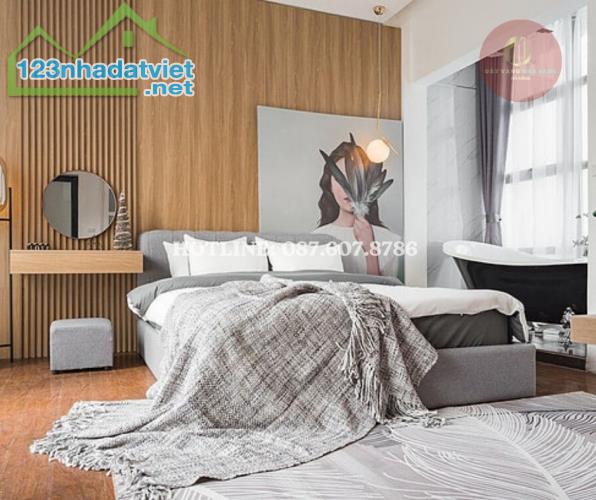 KHÁCH SẠN MINI 5 TẦNG đường Trường Sa 15m, vỉa hè 9m