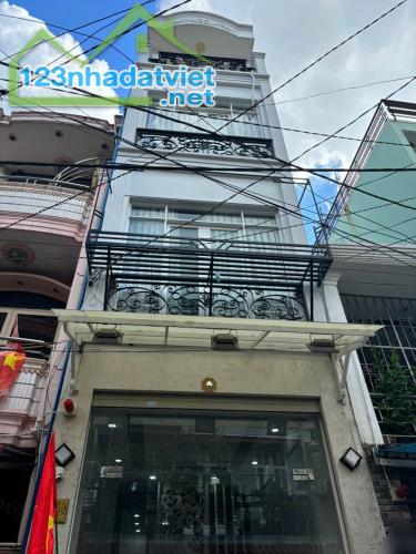 Bán nhà HXH  cách 200m ra đường Lạc Long Quân Quận Tân Bình 37 m2, 4 PN, 6.X tỷ