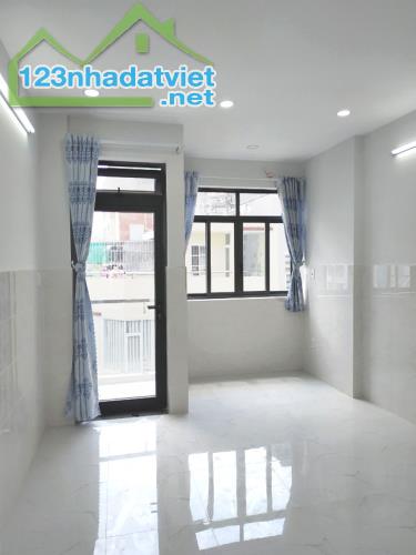 Cho nữ thuê Phòng trọ Q.Bình Thạnh, 25m2 mới đẹp, ban công, cửa sổ, hẻm 7m. Giá rẻ nhất kh - 1