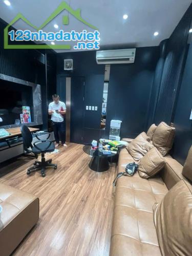 BÁN NHÀ NGUYỄN KHANG - NGÕ THÔNG DT 56m2 7 tầng MT 4m Giá 15.3 tỷ