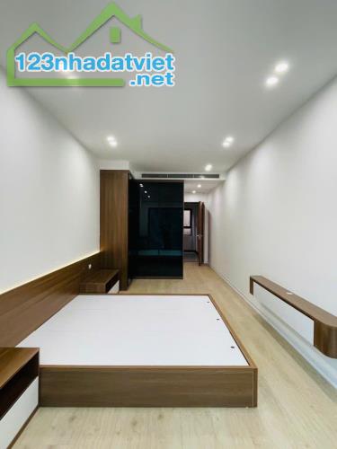 BÁN NHÀ 7 TẦNG PHỐ  ĐẶNG TIẾN ĐÔNG-ĐỐNG ĐA-THANG MÁY - NGÕ Ô TÔ TRÁNH -13.8 TỶ
