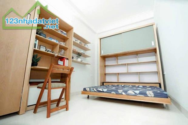 NHÀ DÂN XÂY. TRUNG KÍNH. CẦU GIẤY. 7 TẦNG THANG MÁY HIỆN ĐẠI. 100 M2. GIÁ 28 TỶ. - 2