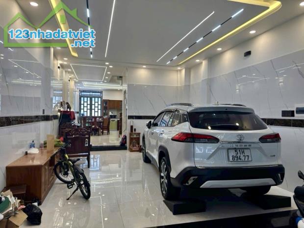 Lê thị hông - 4 tầng - thang máy -105m2 - đường 10 -giá hơn 17 tỷ - gò vấp - 3