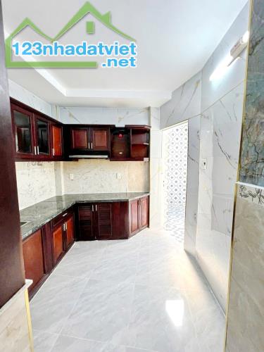 Bán nhà mới 3 lầu 74m2 gần MT đường Phạm Thế Hiển P.4 Quận 8 - 1