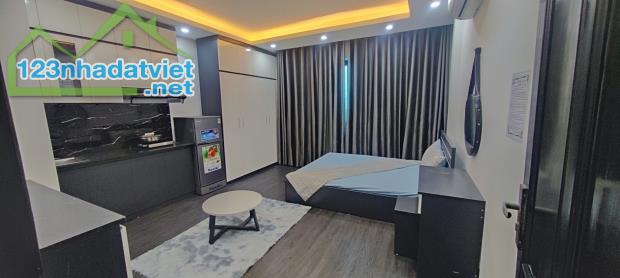 BÁN TÒA CCMN HỒ TRIỀU KHÚC 80M2 7 TẦNG THANG MÁY 18PKK GIÁ 15 TỶ - 2