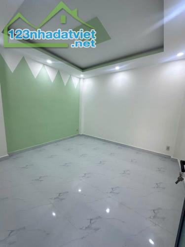 Bán nhà mới Dương Bá Trạc P.1 Quận 8. Cách mặt t.i.ề.n đường khoảng 100m. - 2
