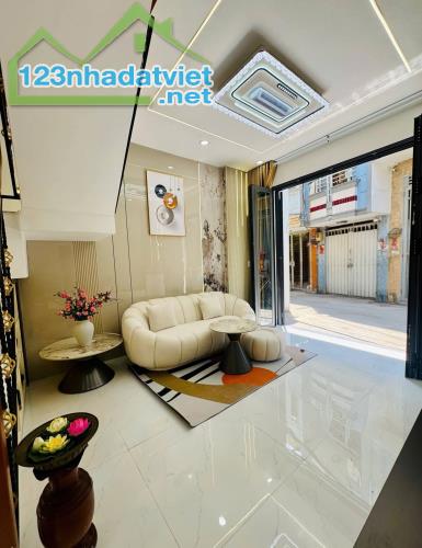 Bán nhà mới Âu Dương Lân P.3 Q.8. Kết cấu 3 tầng 3PN 3WC. - 1