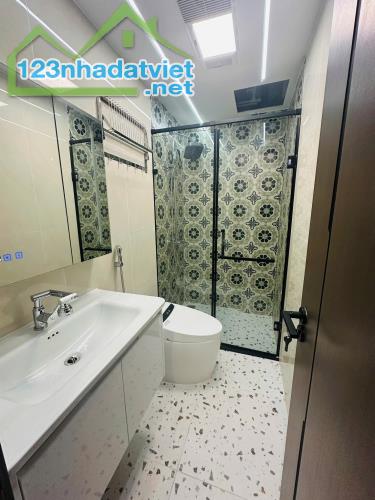 NHÀ  NGỌC HỒI 6 TẦNG THANG MÁY - GARA Ô TÔ 7 CHỖ - TẶNG FULL NỘI THẤT 5  SAO - 2