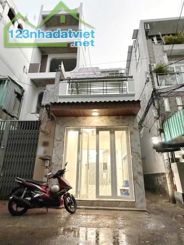 Nhà mới góc 2 tầng mặt tiền chợ Trần Văn Thành P8Q8. Giá: 5.39 tỷ