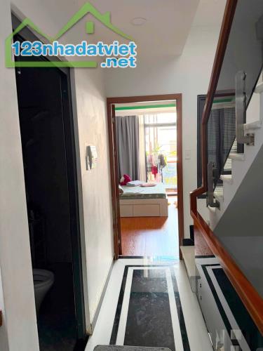 Nhà mới 4 tầng mặt tiền Nguyễn Thị Tần P2Q8. Giá: 12.7 tỷ - 4