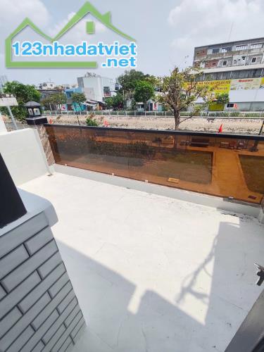Nhà mới 4 tầng mặt tiền đường Ụ Cây P10 Q8. Giá: 5.39 tỷ - 2